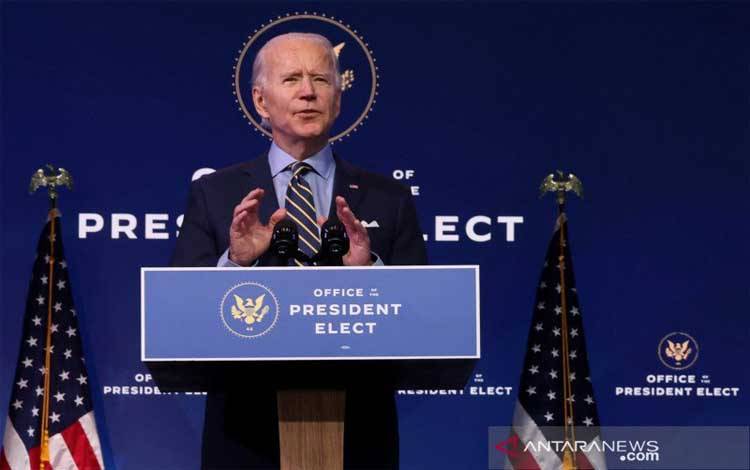 residen Amerika Serikat terpilih Joe Biden memberikan pidato tentang kebijakan luar negeri dan keamanan nasional di kantor transisinya di Wilmington, Delaware, Amerika Serikat, Senin (28/12/2020)