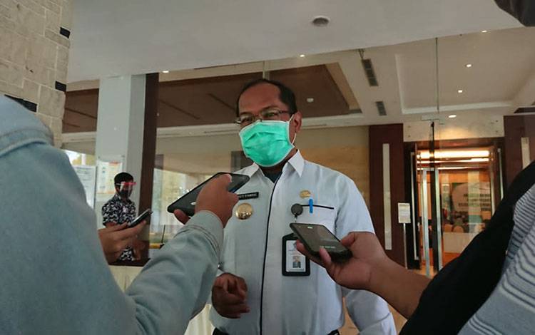 Vaksinasi Pertama Kalteng Dilaksanakan Vaksinator Puskesmas Menteng