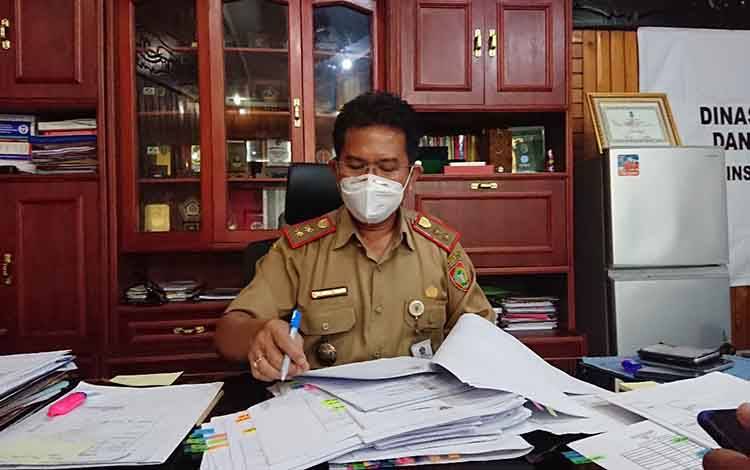Kepala Dinas Tenaga Kerja dan Transmigrasi (Disnakertrans) Kalteng, Rivianus Syahril Tarigan.