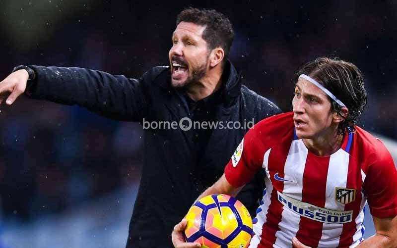 Digeo Simeone dan Filipe Luis.(foto : goal.com)