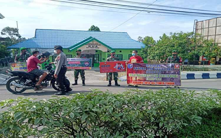 Koramil Teweh Tengah Bersama Polsek Sosialisasikan Tentang Karhutla kepada Masyarakat