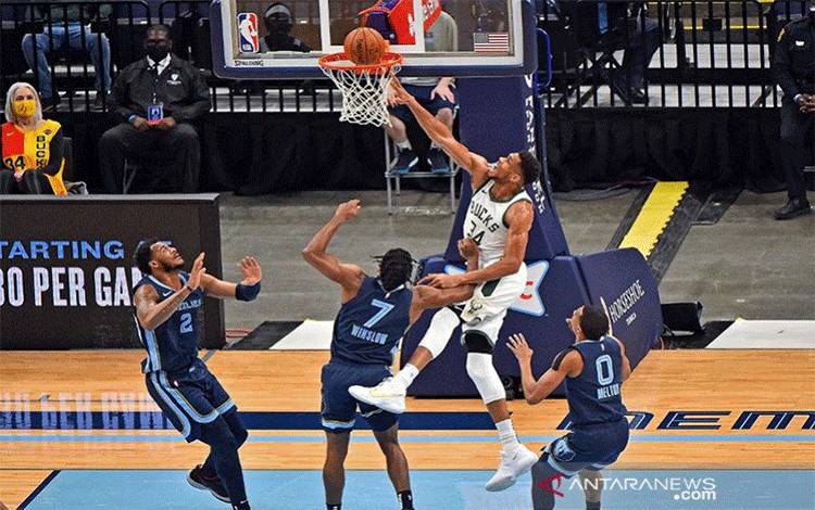 Jonas Valanciunas Pimpin Grizzlies Tundukkan Wizards