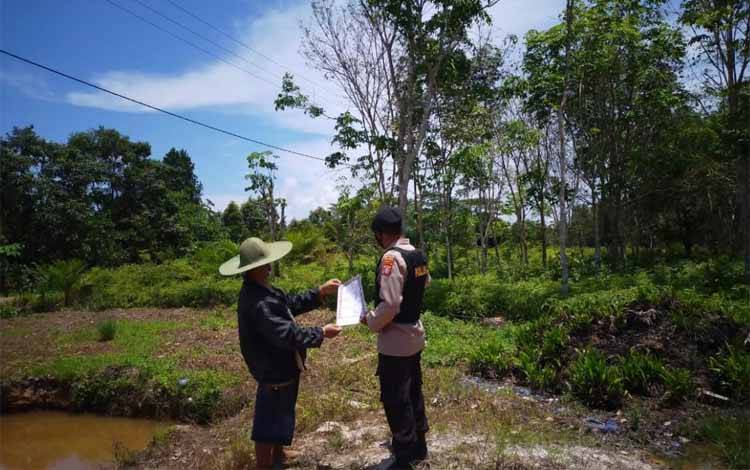 Polsek Danau Sembuluh Ingatkan Warga Tentang Bahaya Karhutla