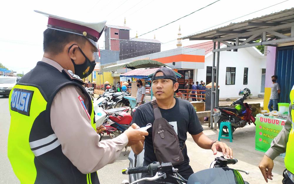 Satlantas Polres Pulang Pisau Gencarkan Penertiban Lalu Lintas dan Protokol Kesehatan di Bulan Ramadan