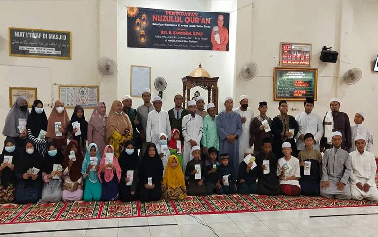 Gelar Peringatan Nuzulul Quran dengan Berbagi Kepada Anak Yatim
