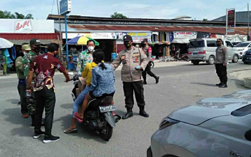 Polsek Timpah Kembali Ingatkan Masyarakat Disiplin Terapkan Prokes