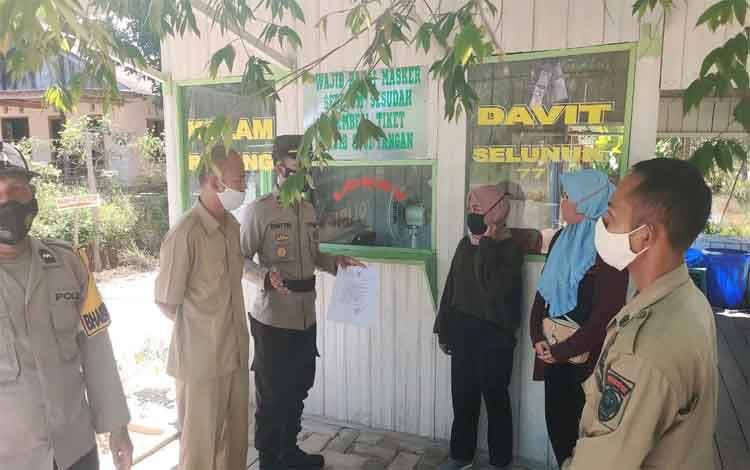 Polsek Danau Sembuluh Sosialisasikan Penutupan Tempat Wisata