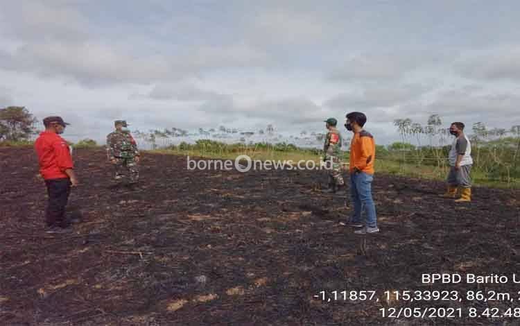 Anggota Koramil Teweh Timur Cek Titik Api di Desa Mempuak II