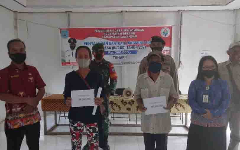 Babinsa 1017-03/Delang Kawal Penyaluran BLT-DD Tahap I di Penyombaan