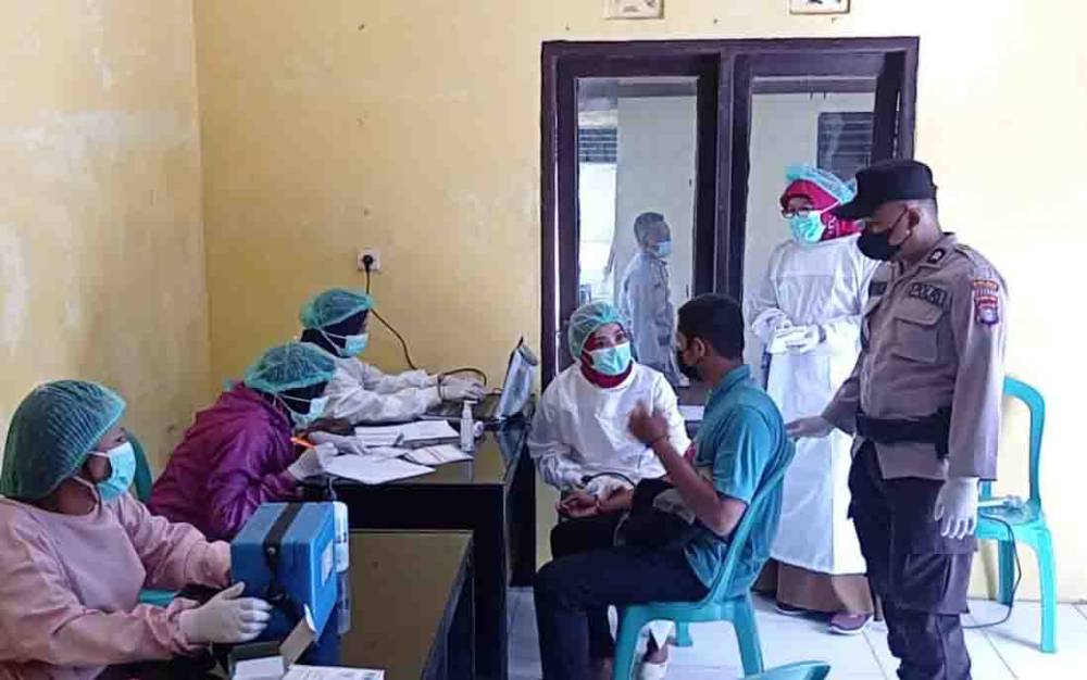 Polsek Balai Riam Terus Kawal Kegiatan Vaksinasi Covid-19