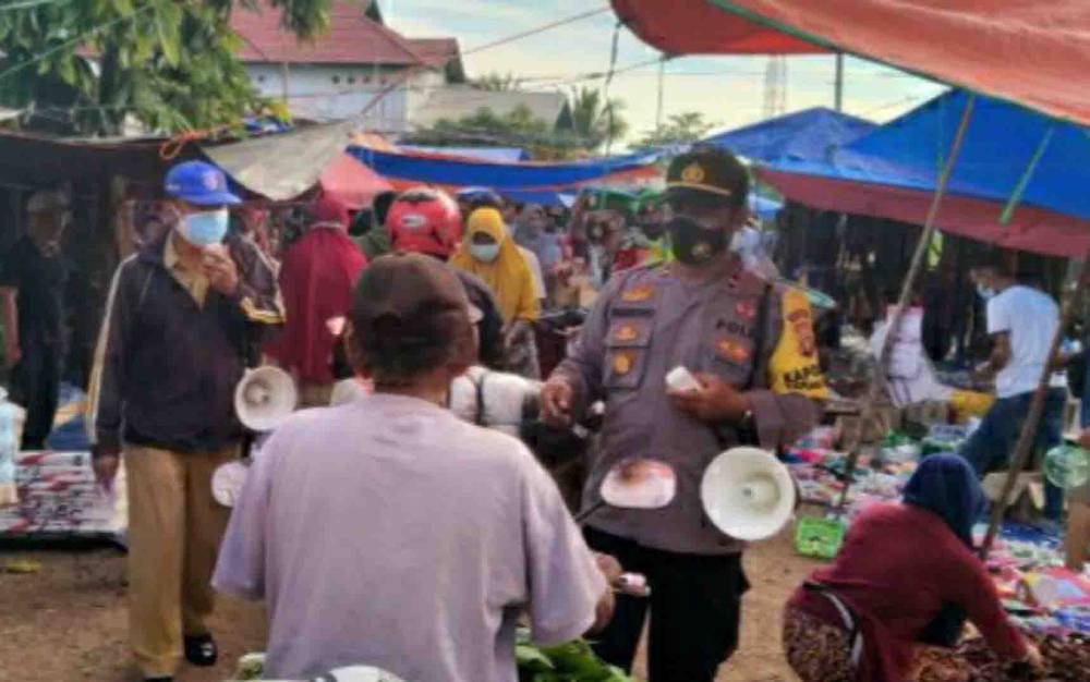 Kapolsek Kapuas Kuala Imbau Penerapan Prokes di Pasar Tradisional