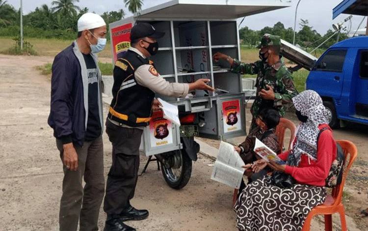 Lewat Program Bajaka Presisi, Personel Polsek Kapuas Timur Ajak Warga Gemar Membaca