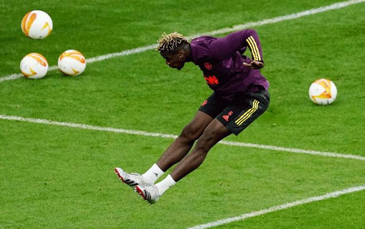 Paul Pogba dari Manchester United selama latihan untuk Europa League, Final Manchester United Training di Stadion Energa Gdansk, Gdansk, Polandia, Selasa (25/5/2021). ANTARA FOTO/Pool via REUTERS/Aleksandra Szmigiel/AWW/sa.