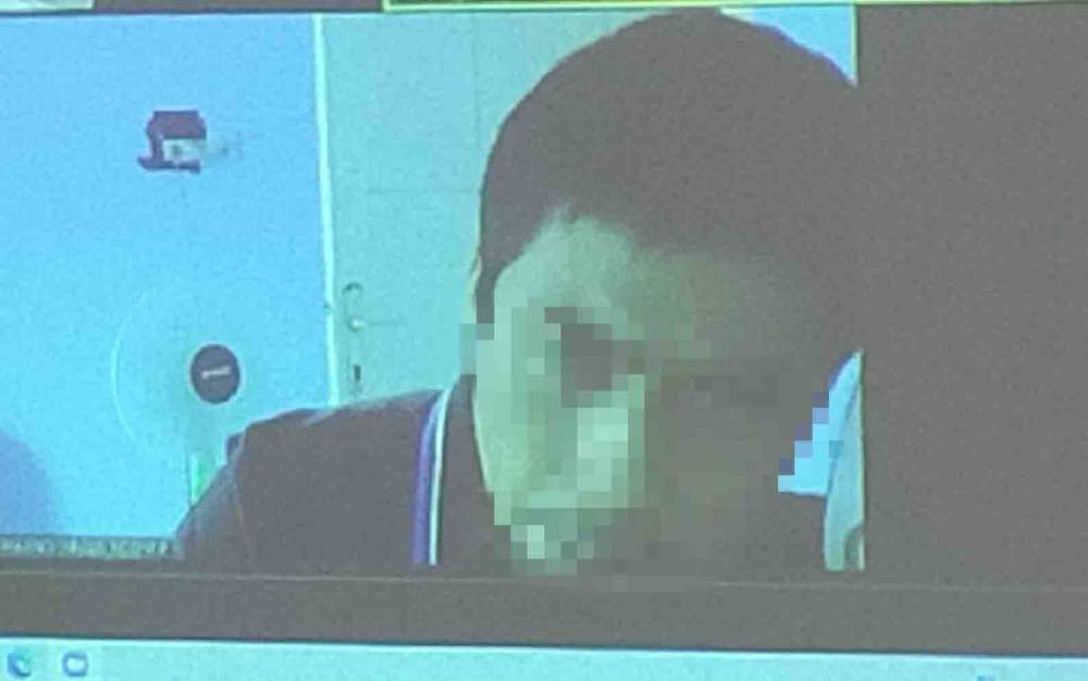Terdakwa saat menjalani sidang virtual yang digelar PN Palangka Raya, Kamis, 12 Agustus 2021.