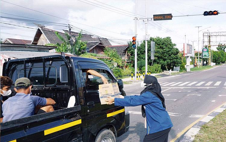Hima Kobar Palangka Raya Turun Jalan Galang Dana Untuk Korban Banjir Arut Utara