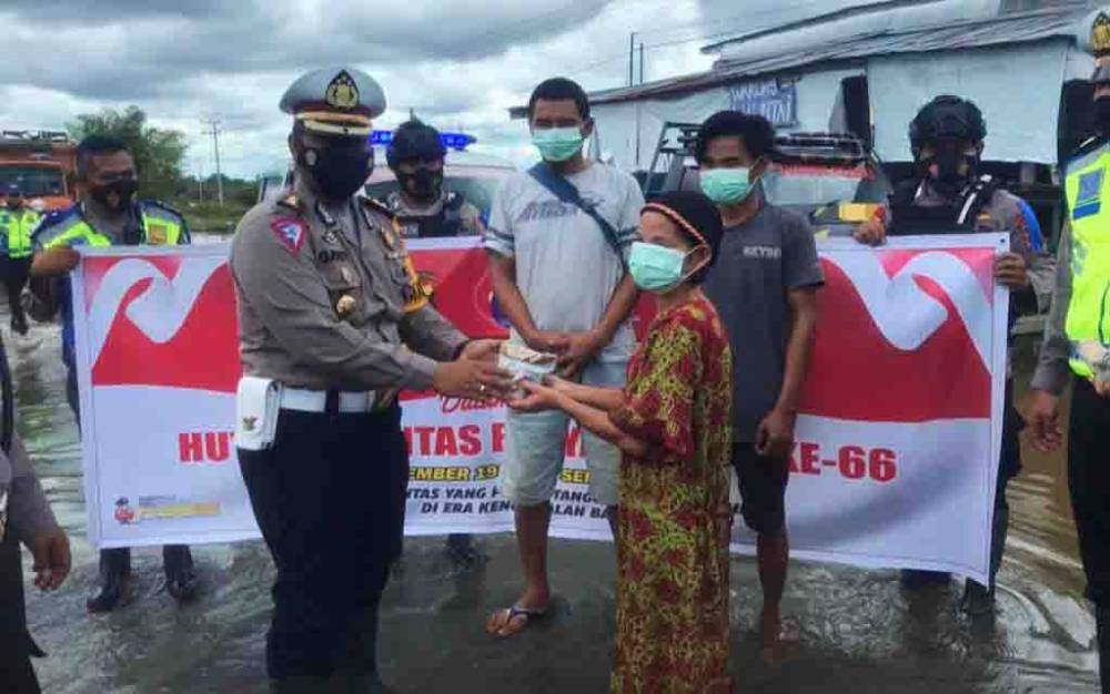Warga Diminta Tidak Melintasi Lokasi Banjir di Desa Bukit Rawi pada Malam Hari