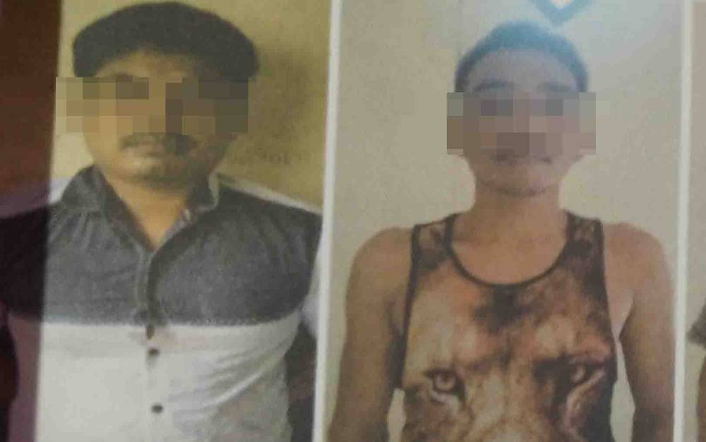 Tersangka pencurian sawit, Muhammad Mulyana alias Yayan dan Kusmawata alias Ikus.