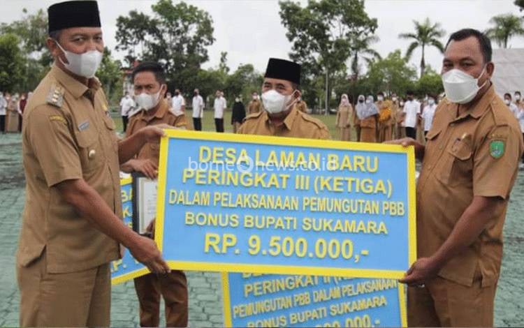 Pemberian Insetif Kepada Desa Beprestasi PBB-P2 Untuk Memotivasi Wajib Pajak?