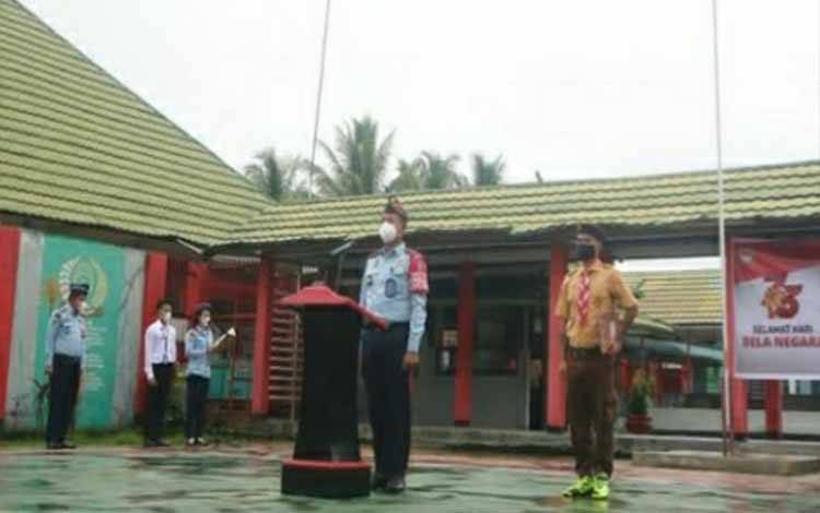 Rutan Kuala Kapuas Upacara Bendera Peringati Hari Bela Negara