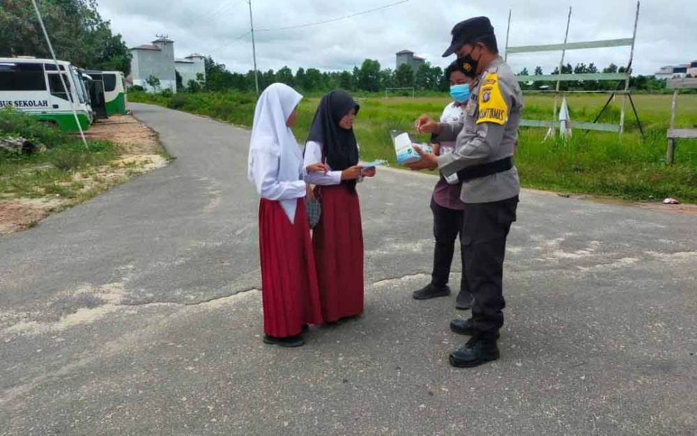 Polsek Danau Sembuluh Temukan Pelajar ke Sekolah Tidak Kenakan Masker