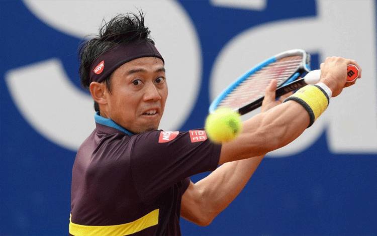 Petenis Jepang Kei Nishikori (Photo by Josep LAGO / AFP) (AFP/JOSEP LAGO)