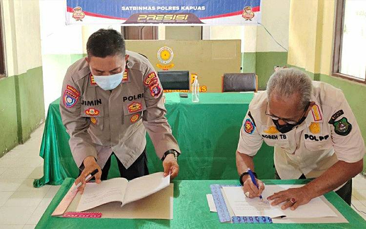 Satpol PP Damkar Kapuas dan Polres Tandatangani Nota Kesepahaman Pemeliharaan Kamtibmas