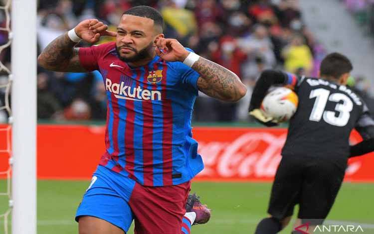 Barcelona Berencana Perpanjang Kontrak Memphis Depay