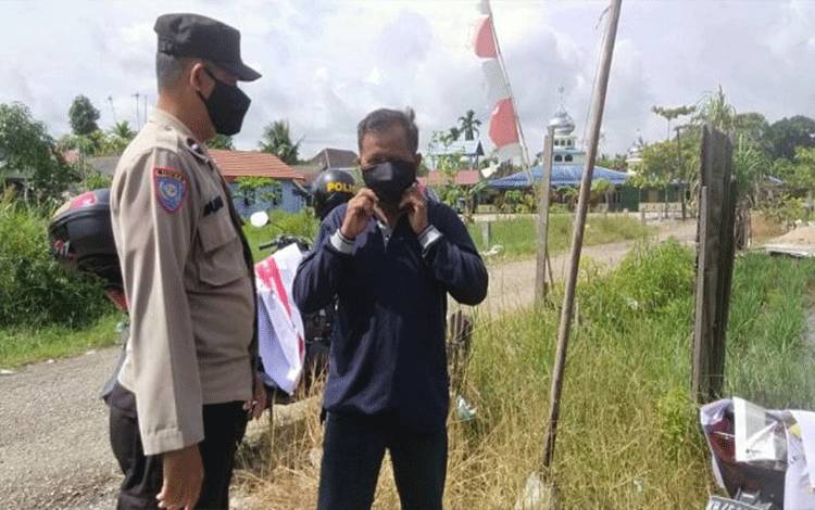 Warga Kapuas Timur Terus Diingatkan Pakai Masker Cegah Covid-19