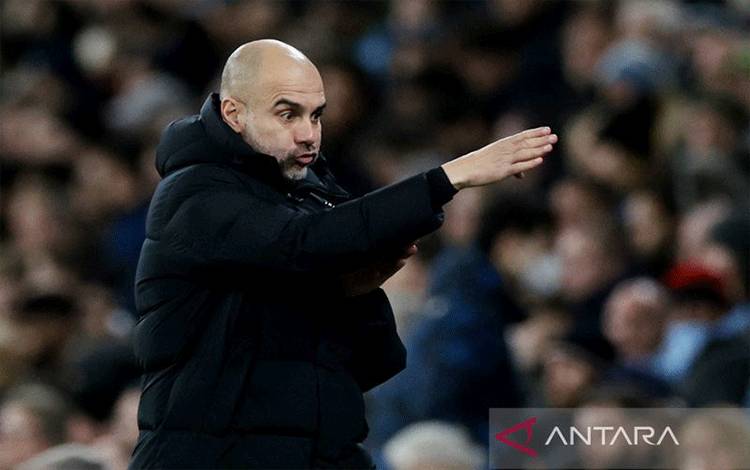 Pelatih Manchester City Pep Guardiola memimpin timnya pada Liga Champions melawan Sporting CP di Etihad Stadium, Manchester, Inggris (9/3/2022). ANTARA/REUTERS/Action Images/Lee Smith/aa.
