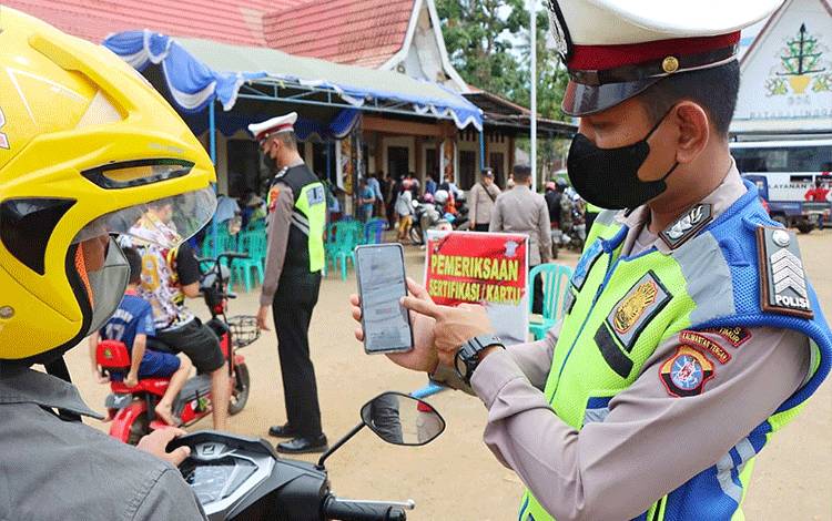 Polres Barito Timur Gelar Vaksinasi Drive Thru di Ampah