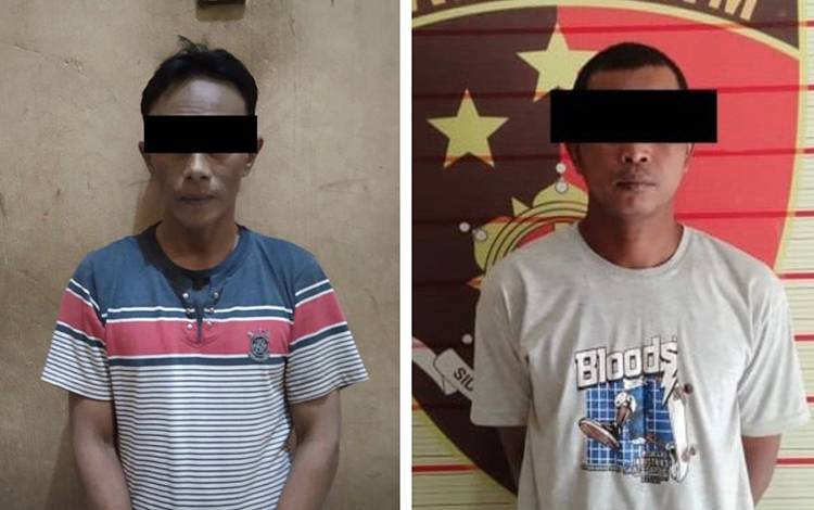 Tersangka SY (49) dan S (41) saat diamankan di Mapolres Lamandau.(FOTO : HENDI NURFALAH)