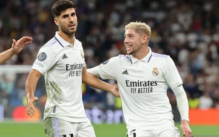 Selebrasi Marco Asensio (kiri) usai mencetak gol untuk Real Madrid ke gawang RB Leipzig dalam pertandingan Grup F Liga Champions pada 15 September 2022. ANTARA/AFP/THOMAS COEX