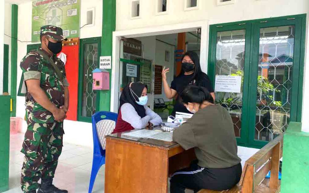 Koramil 1013-05 Gunung Purei Lakukan Pendampingan Pelayanan KB dan Kesehatan