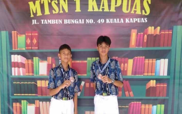 2 Pelajar MTsN 1 Kapuas Raih Prestasi pada Kejuaraan Pencak Silat Kecamatan Kapuas Timur
