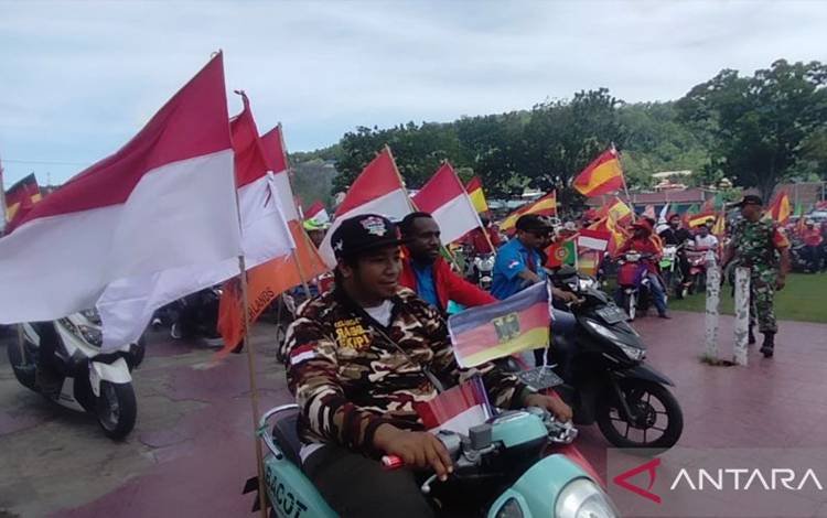 Ribuan Bendera Merah Putih Warnai Konvoi Piala Dunia 2022 di Manokwari