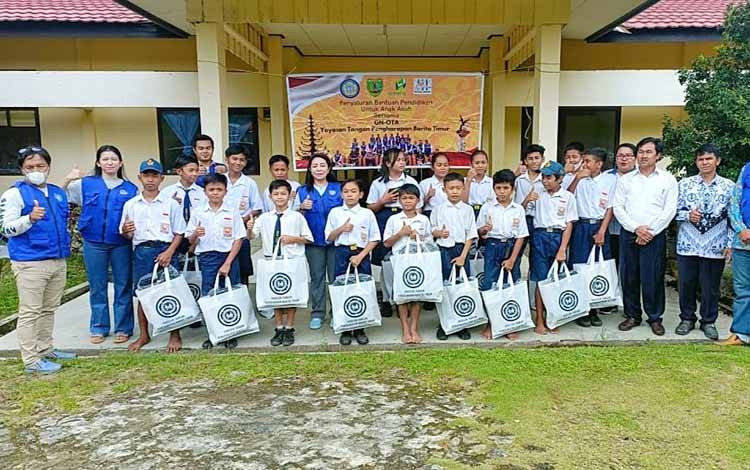 GN-OTA Yayasan Tangan Pengharapan Salurkan 121 Paket Bantuan Pendidikan di 4 Kecamatan