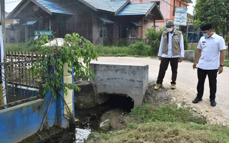 Curah Hujan Tinggi, Bupati Lamandau Imbau Warga Bersihkan Saluran Air