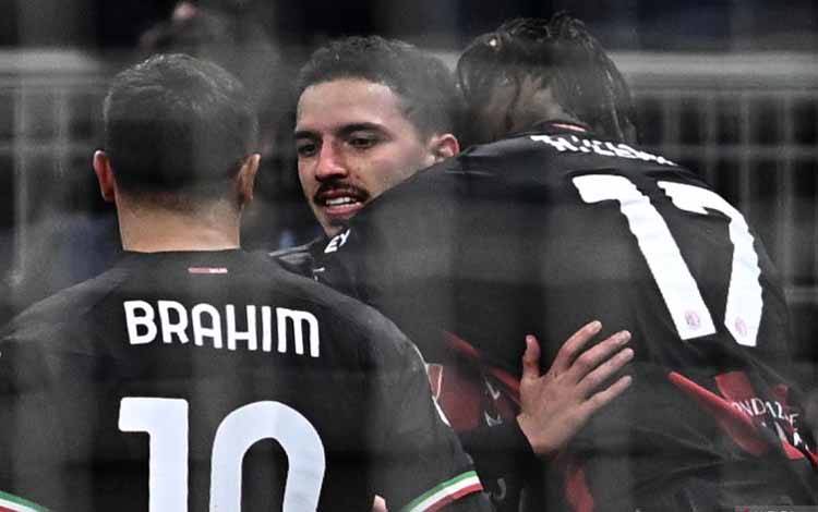 Para pemain AC Milan saat pertandingan leg pertama babak perempat final Liga Champions di San Siro stadium, Milan, pada 12 April 2023 (Photo by GABRIEL BOUYS / AFP) (AFP/GABRIEL BOUYS)