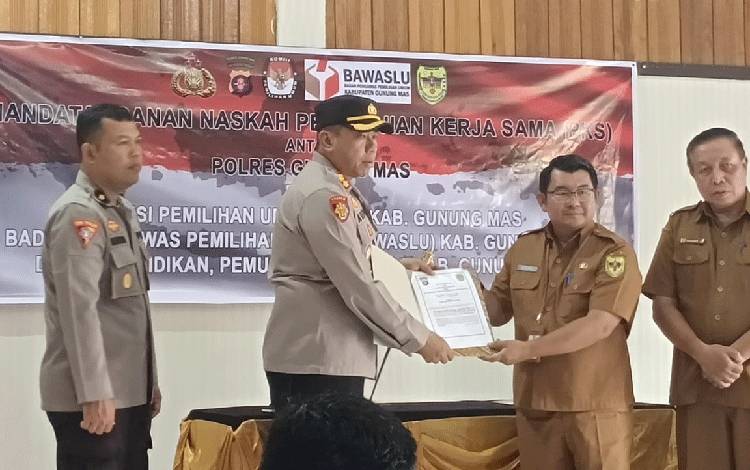 Kapolres Gunung Mas dan Plt Kepala Disdikpora Tanda Tangan MoU Soal ini