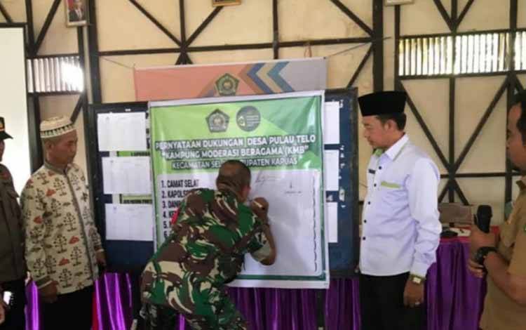 Pokja KMB Selat Lakukan Penandatanganan Dukungan Kampung Moderasi Beragama di Desa Pulau Telo
