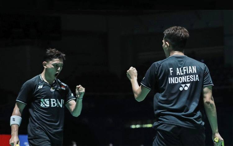 Fajar/Rian Melaju ke 16 Besar Usai Kalahkan He/Zhou Lewat Rubber Game