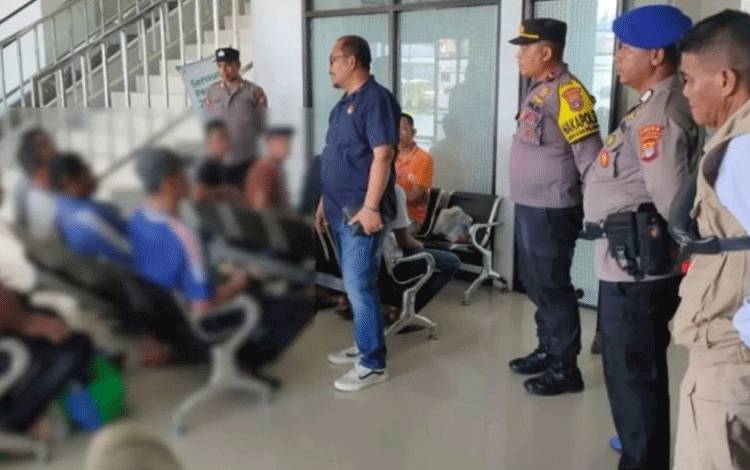Polisi?Amankan Deportasi Pekerja Migran Indonesia dari Malaysia