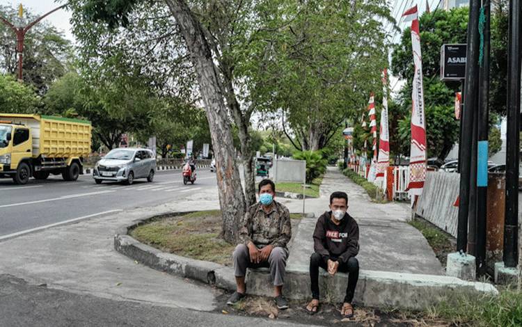 Aktivitas masyarakat Kota Palangka Raya saat menggunakan masker, Jumat 25 Agustus 2023.?(Foto: Marini)