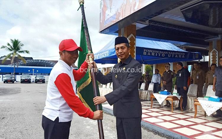 Pj Bupati Barito Utara Lepas Peserta Upacara Peringatan HSP ke 95 dan IBAB Tingkat Kalteng