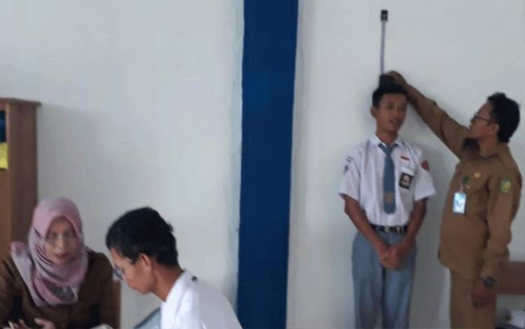 UPTD Puskesmas Bukit Hindu Gencar Lakukan Penjaringan Kesehatan Siswa untuk Tahun Ajaran Baru 2023 - 2024