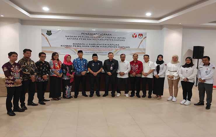 Pj Bupati Kapuas Bersama KPU dan Bawaslu Tandatangani NPHD Pilkada 2024