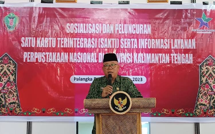 Kepala Pusat Jasa Informasi Perpustakaan Dan Pengelolaan Naskah Nusantara Perpusnas RI saat membacakan sambutan di Aula Kantor BPSDM, Palangka Raya, Rabu, 8 November 2023. (FOTO: HADRI)