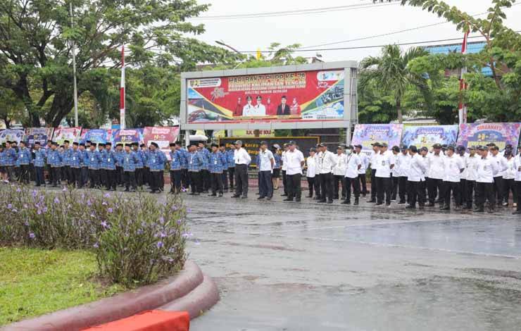 Hujan Tak Pudarkan Semangat Aparat Pemprov Kalteng Peringati Hari Bakti Pekerjaan Umum