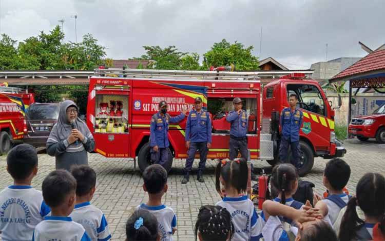 Satpol PP dan Damkar Kapuas Terima Kunjungan Anak anak dari TK Pembina