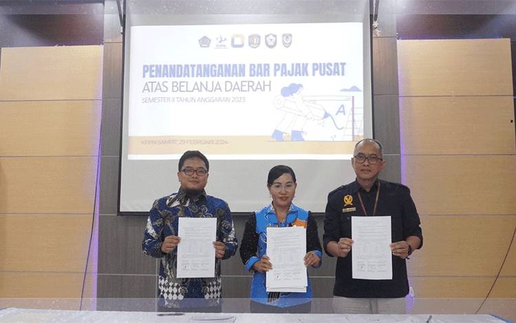 Kepala BKAD Seruyan Tandatangani Berita Acara Rekonsiliasi Pajak